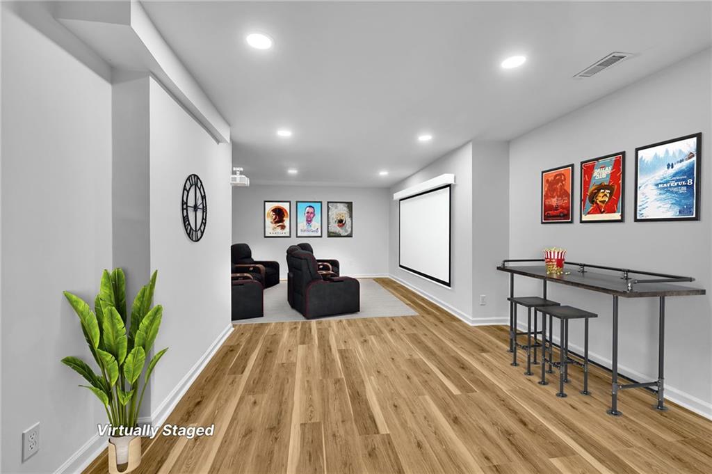 1306 Poplarcrest Circle Southeast Atlanta, GA 30316 - Photo 18 of 24 a living room with furniture and a potted plant