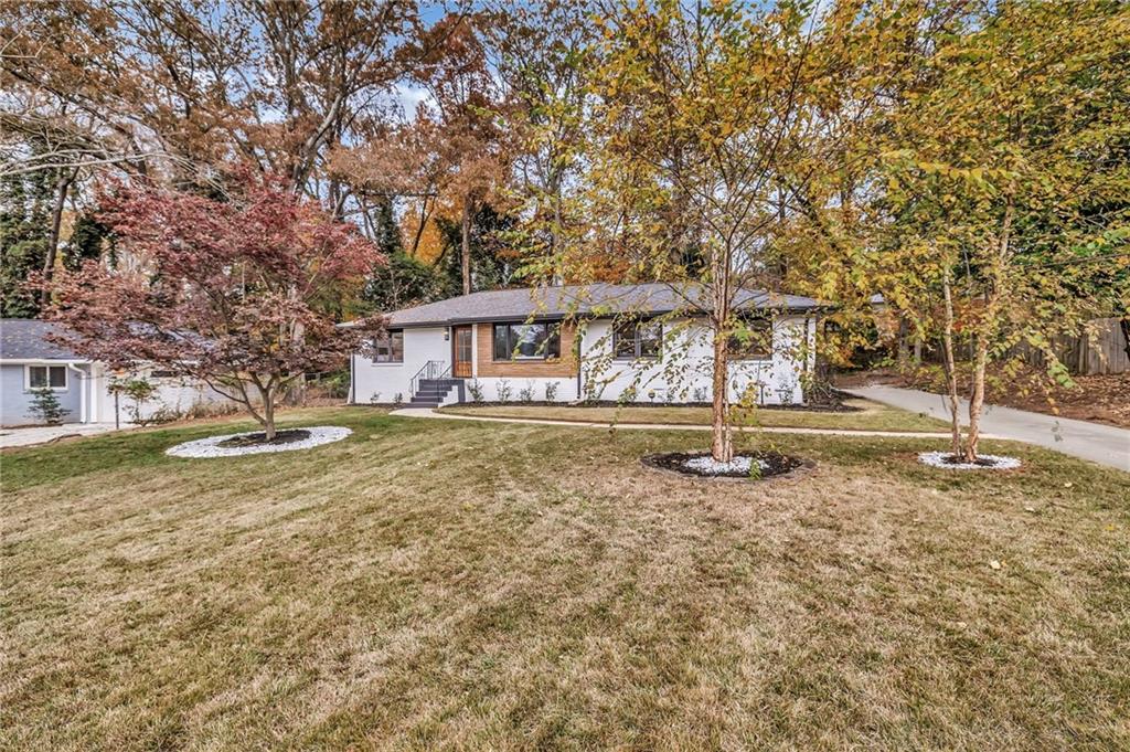 1306 Poplarcrest Circle Southeast Atlanta, GA 30316 - Photo 2 of 24 a view of a house with a yard