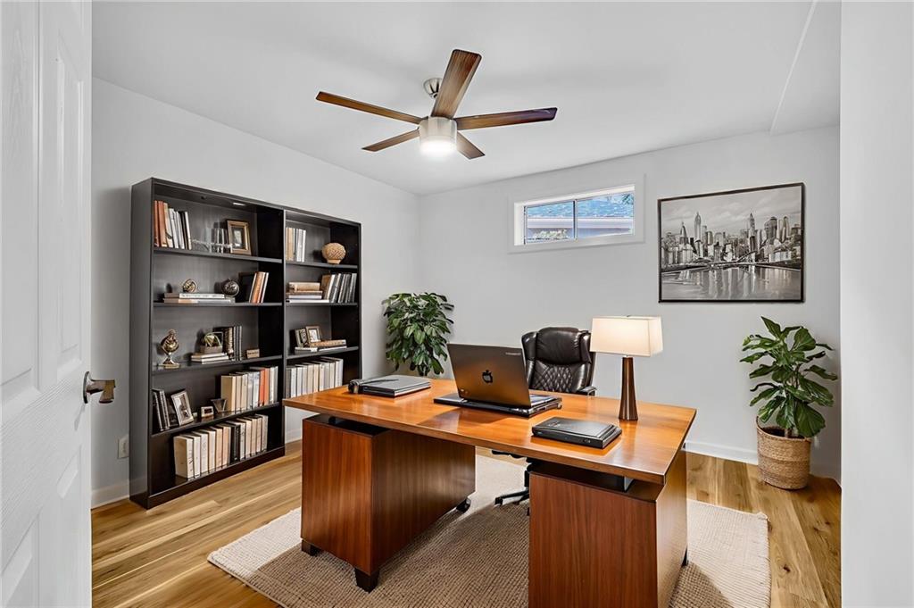 1306 Poplarcrest Circle Southeast Atlanta, GA 30316 - Photo 21 of 24 a view of a workspace with a bookshelf