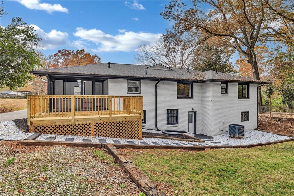 1306 Poplarcrest Circle Southeast Atlanta, GA 30316 - Photo 24 of 24 a front view of a house with a yard