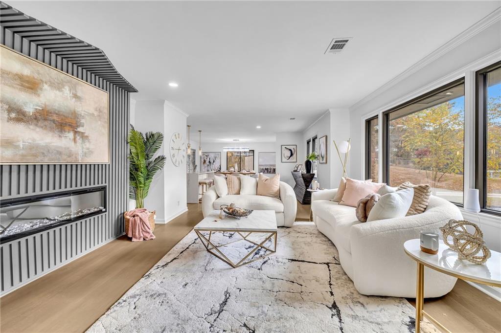 1306 Poplarcrest Circle Southeast Atlanta, GA 30316 - Photo 5 of 24 a living room with furniture and a large window