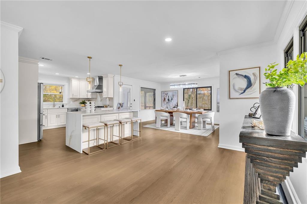 1306 Poplarcrest Circle Southeast Atlanta, GA 30316 - Photo 6 of 24 a kitchen with white cabinets and stainless steel appliances