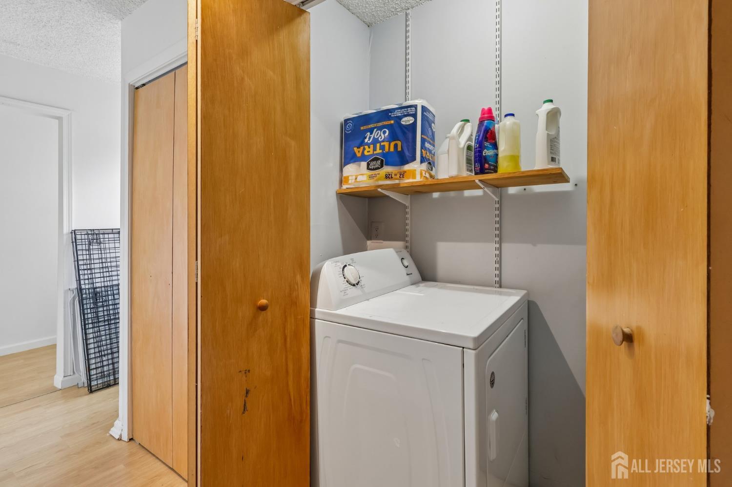 36 Henry Street Edison, NJ 08820 - Photo 20 of 42 a utility room with dryer and washer
