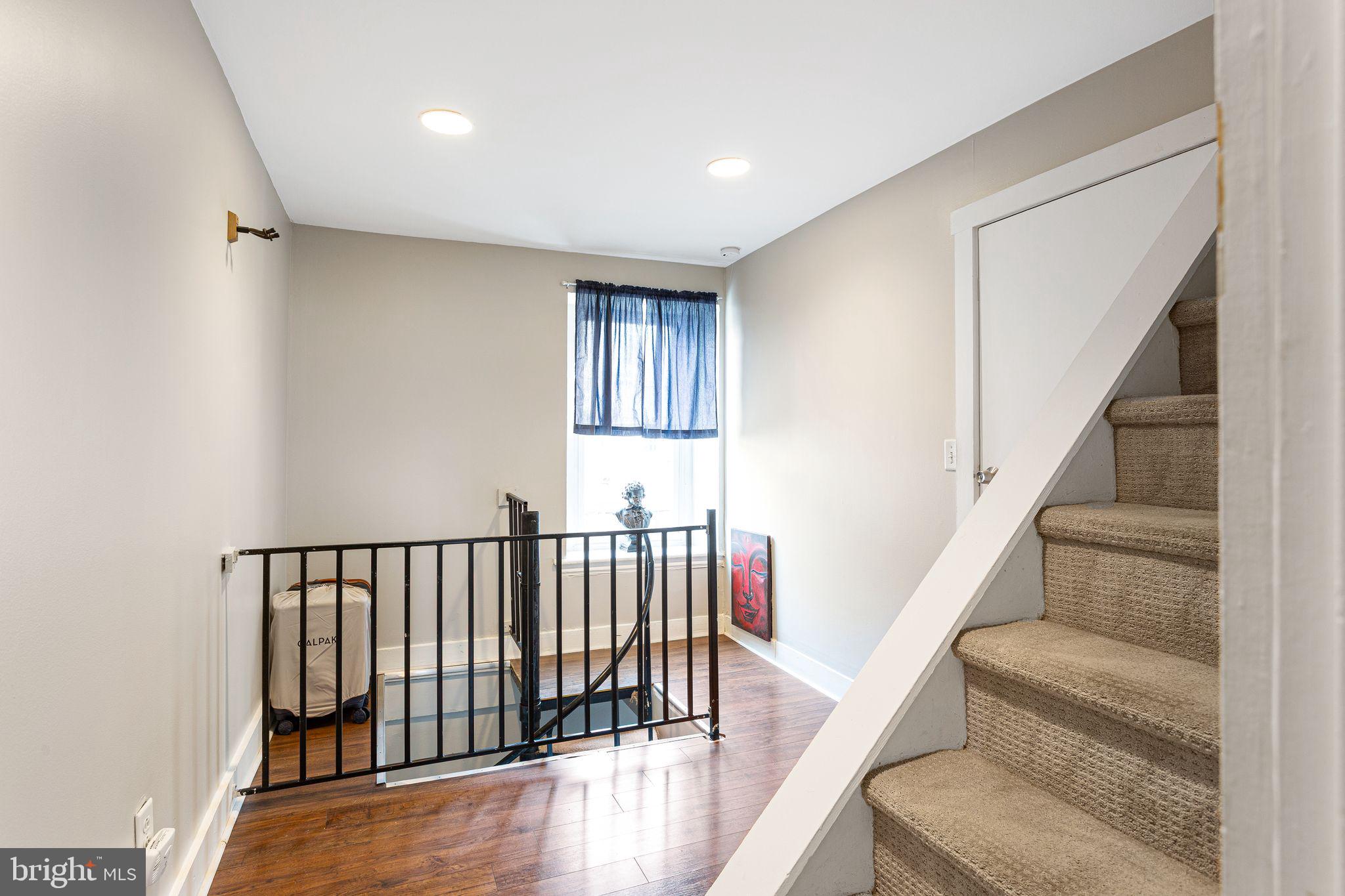 140 Wendover Street Philadelphia, PA 19127 - Photo 5 of 16 a view of entryway with stairs and wooden floor