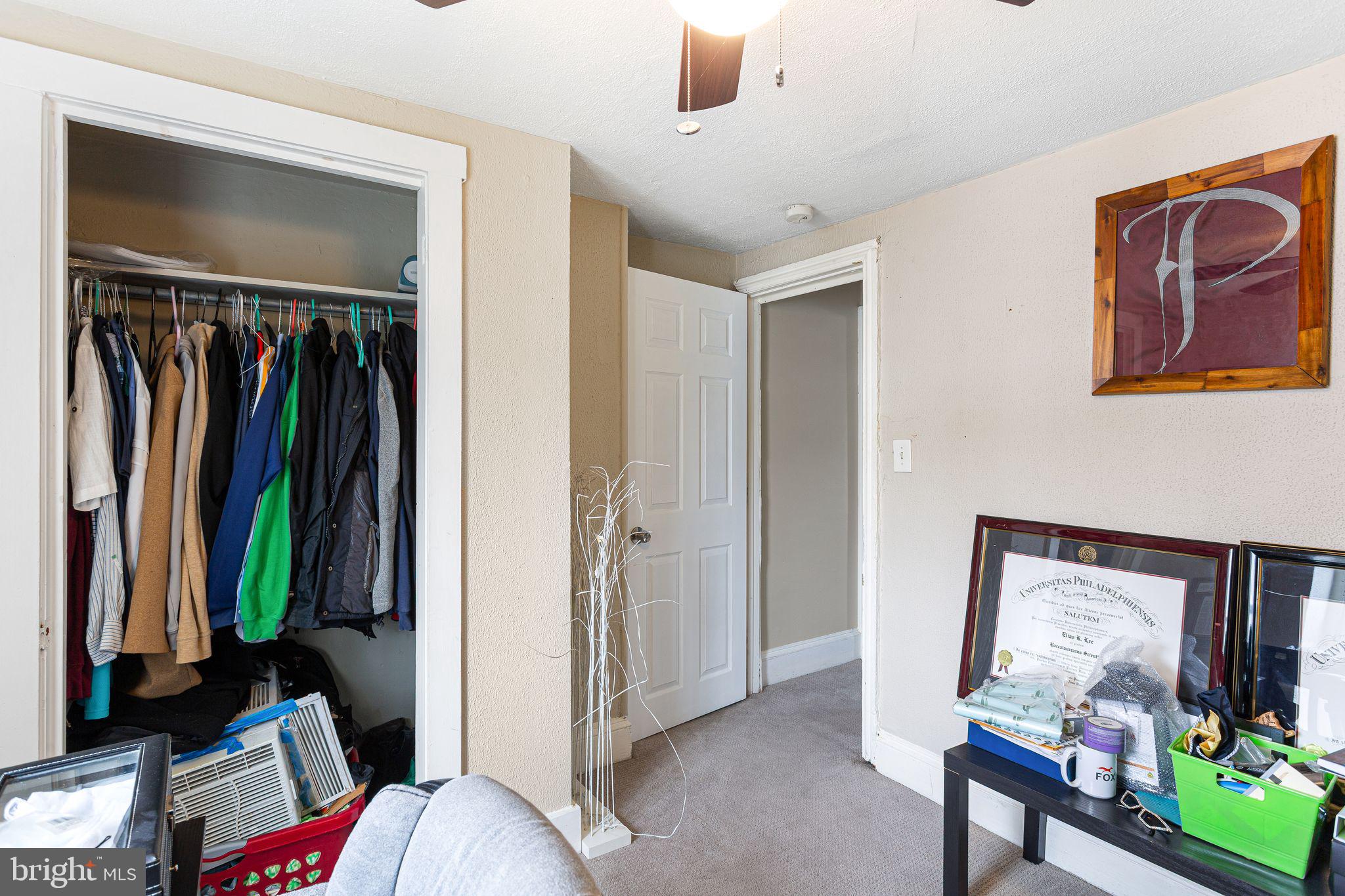 140 Wendover Street Philadelphia, PA 19127 - Photo 10 of 16 a view of walk in closet with clothes and shoes