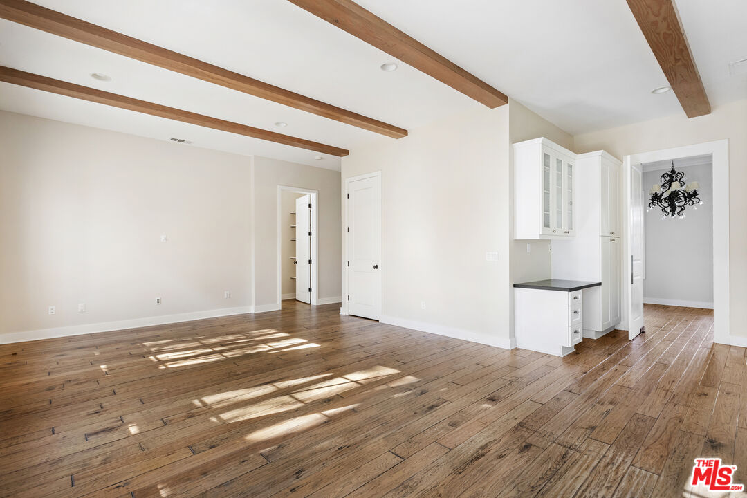 28930 Hampton Place Malibu, CA 90265 - Photo 18 of 55 a view of a room with wooden floor and white walls