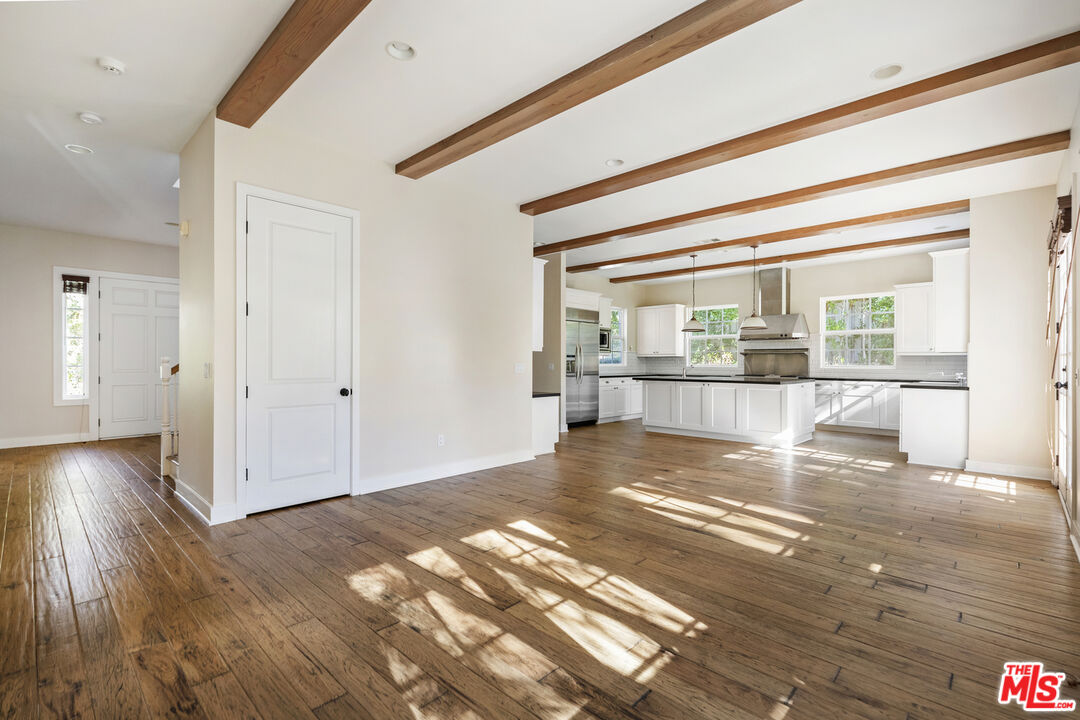 28930 Hampton Place Malibu, CA 90265 - Photo 19 of 55 a view of empty room with wooden floor