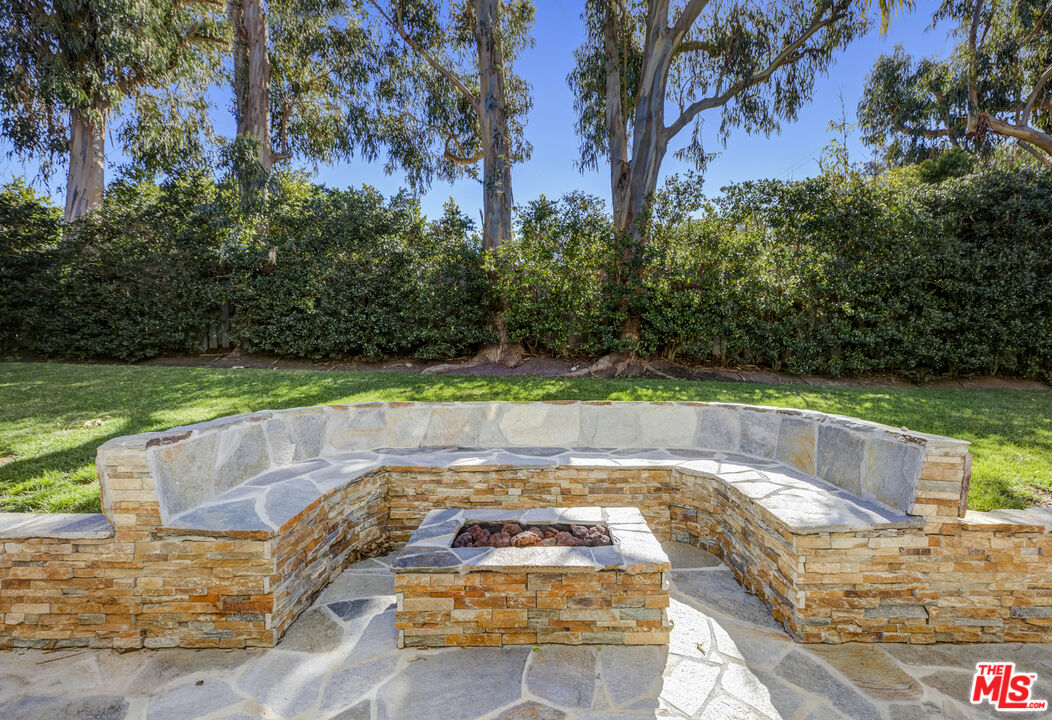 28930 Hampton Place Malibu, CA 90265 - Photo 22 of 55 a view of a backyard with swimming pool