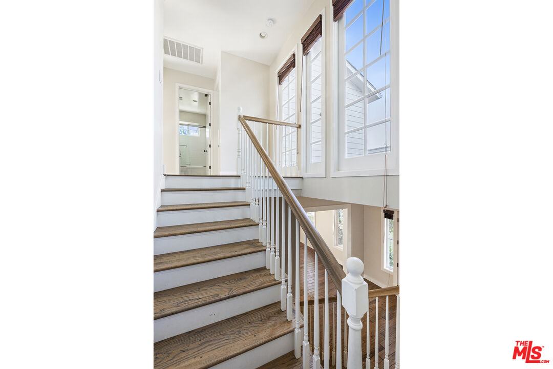 28930 Hampton Place Malibu, CA 90265 - Photo 23 of 55 a view of a hallway with staircase