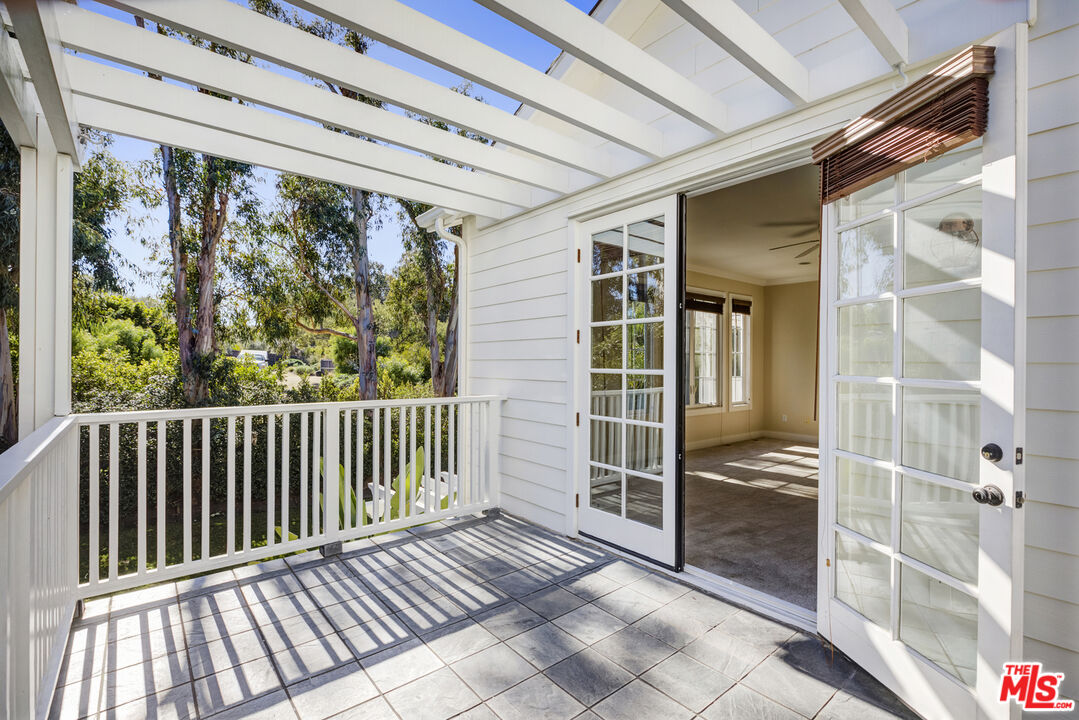 28930 Hampton Place Malibu, CA 90265 - Photo 30 of 55 a view of a balcony with wooden floor