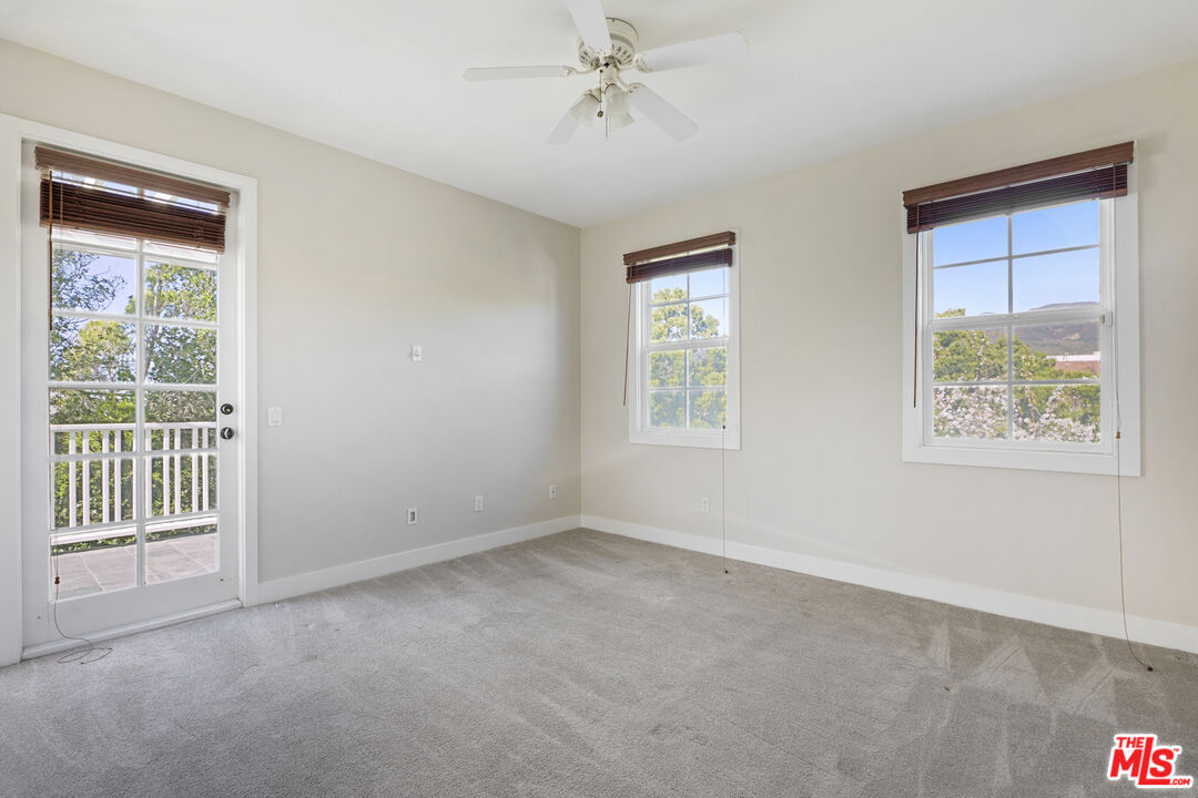 28930 Hampton Place Malibu, CA 90265 - Photo 38 of 55 an empty room with windows