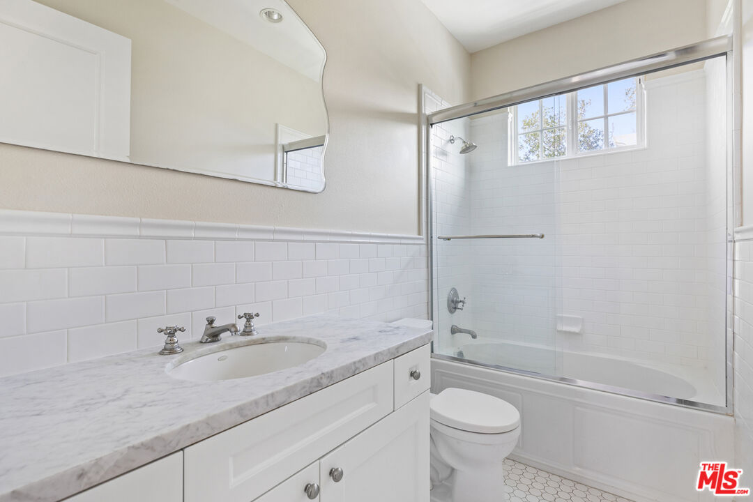 28930 Hampton Place Malibu, CA 90265 - Photo 42 of 55 a bathroom with a sink a toilet and shower