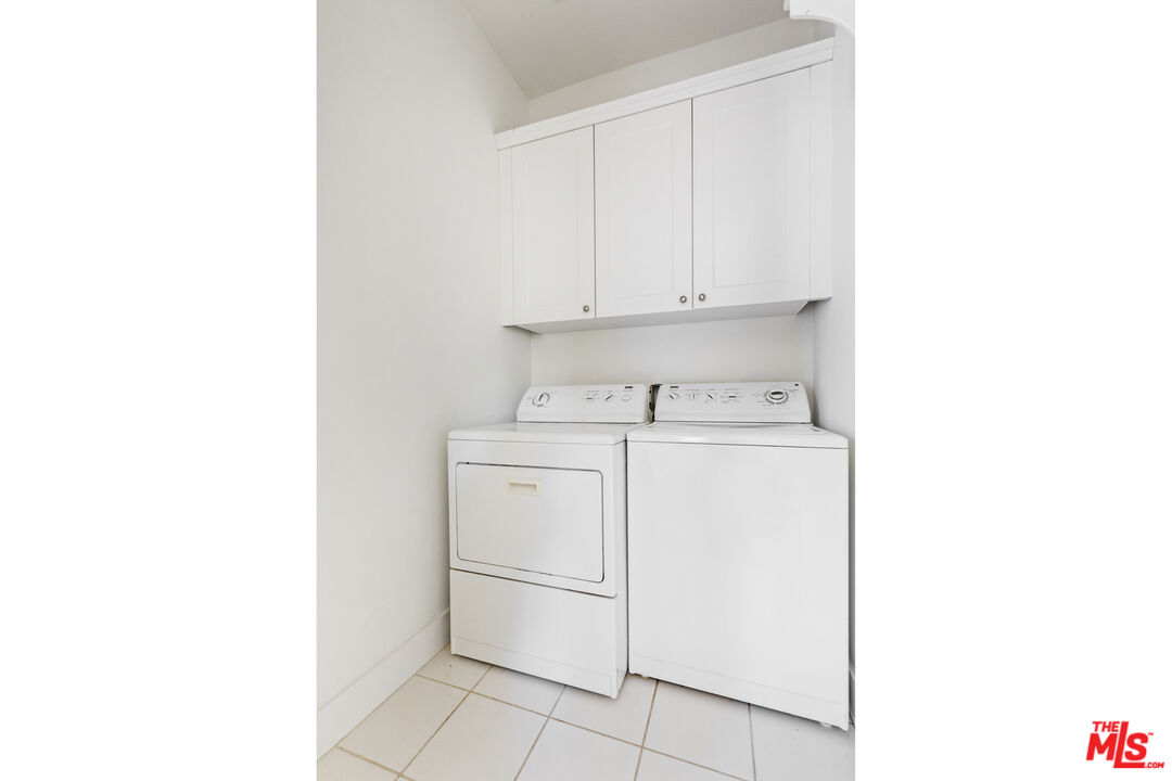 28930 Hampton Place Malibu, CA 90265 - Photo 50 of 55 a utility room with dryer and washer