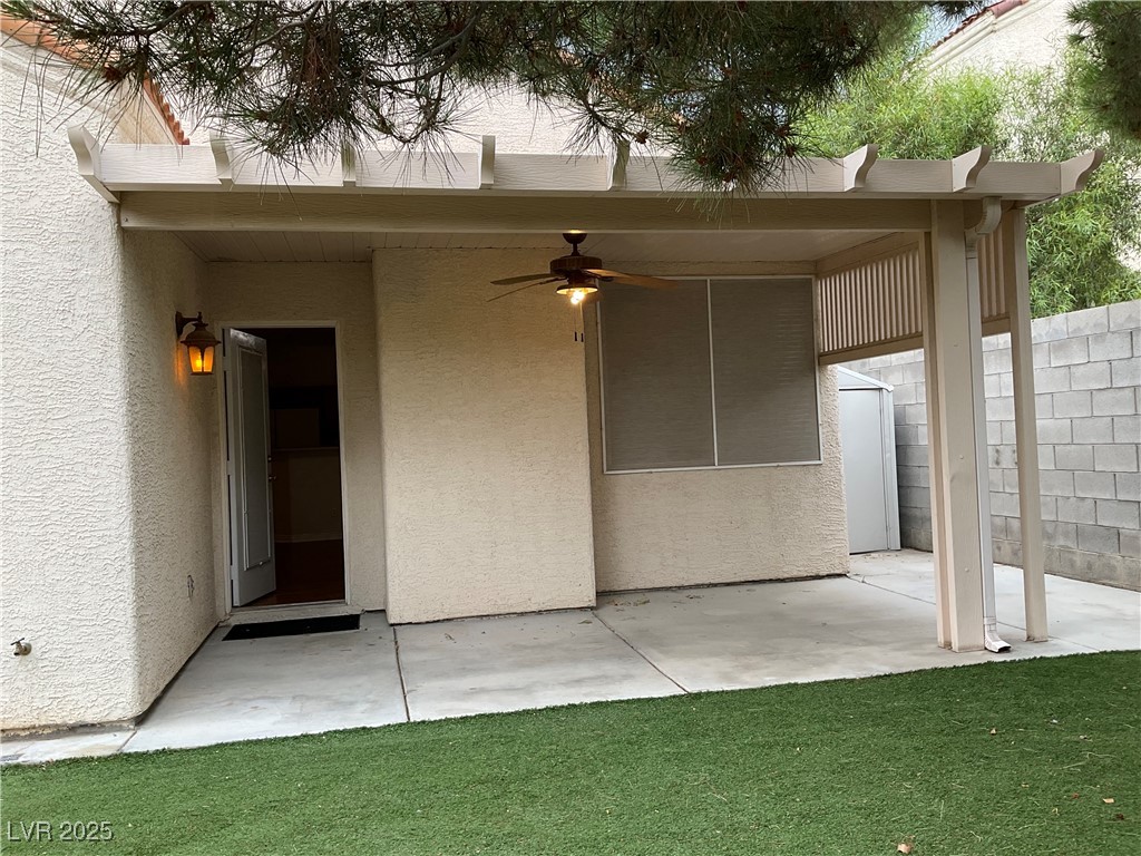 7620 Donald Nelson Avenue Las Vegas, NV 89131 - Photo 26 of 34 View of patio featuring a ceiling fan