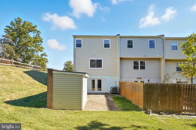 a view of a house with a swimming pool