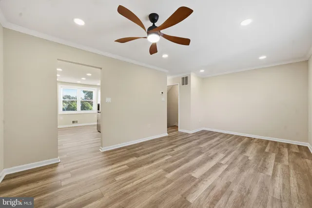 a view of an empty room and window