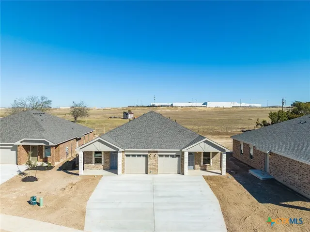 a view of a house with a terrace