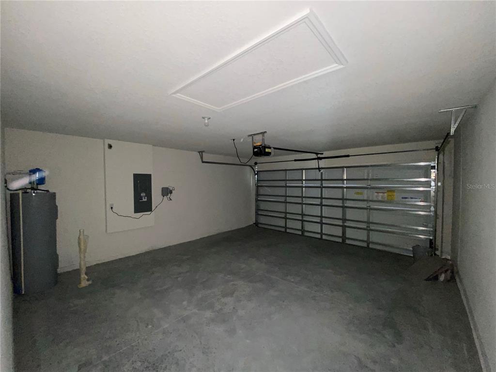 492 Hickory Course Loop Ocala, FL 34472 - Photo 26 of 28 a view of a garage
