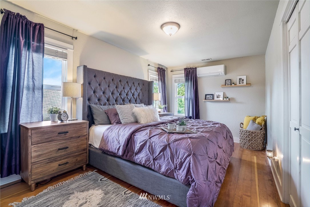 2309 Baker Avenue Everett, WA 98201 - Photo 12 of 26 a bed sitting in a bedroom next to a window