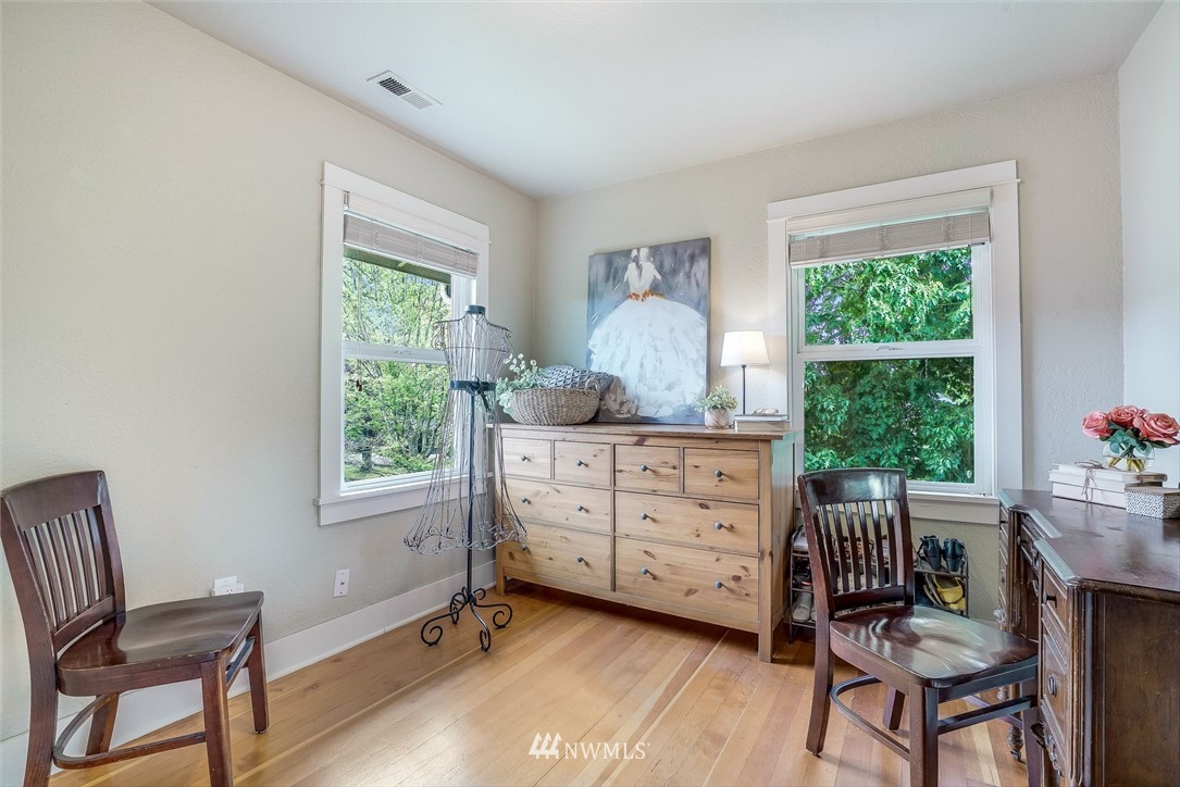 2309 Baker Avenue Everett, WA 98201 - Photo 14 of 26 a room with a window chair and bed