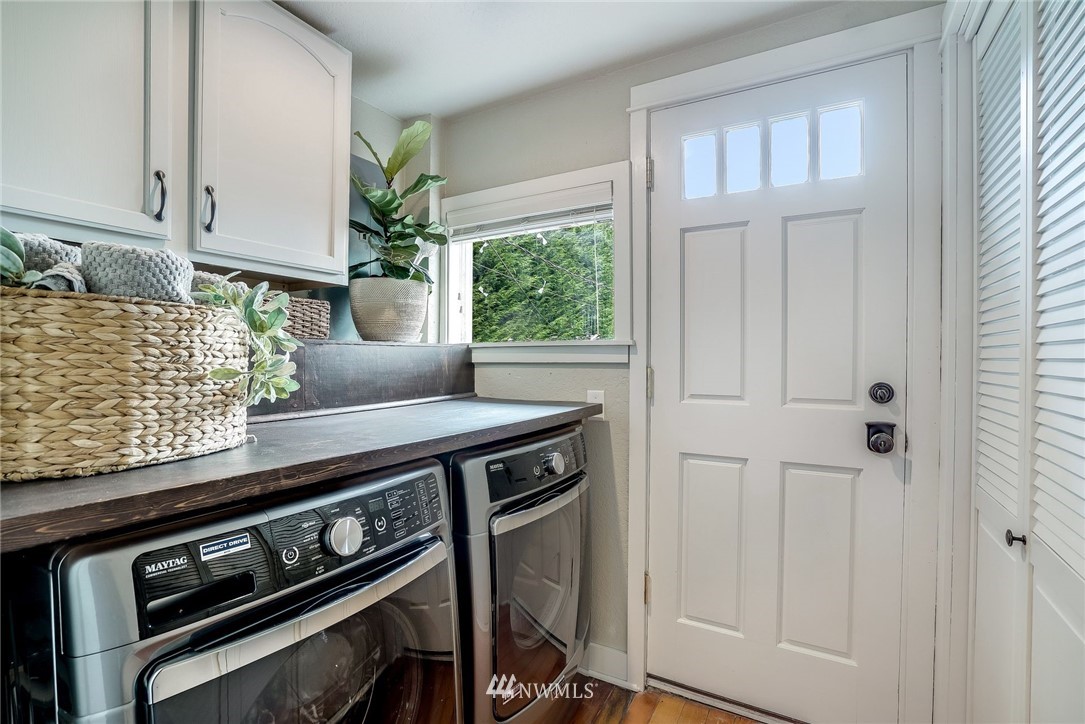 2309 Baker Avenue Everett, WA 98201 - Photo 19 of 26 a stove top oven sitting inside of a kitchen