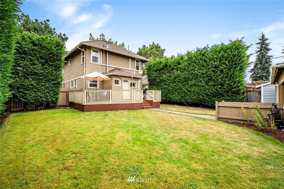 2309 Baker Avenue Everett, WA 98201 - Photo 21 of 26 a house with trees in the background