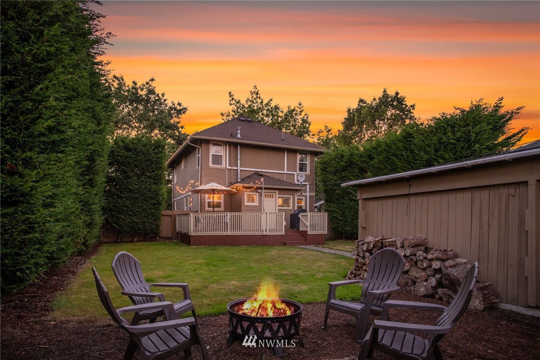 2309 Baker Avenue Everett, WA 98201 - Photo 24 of 26 a view of a patio with chair and tables back yard of the house