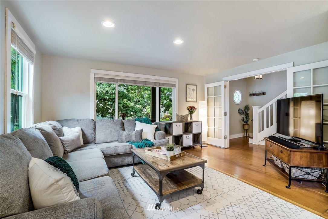 2309 Baker Avenue Everett, WA 98201 - Photo 7 of 26 a living room with furniture flat screen tv and a large window