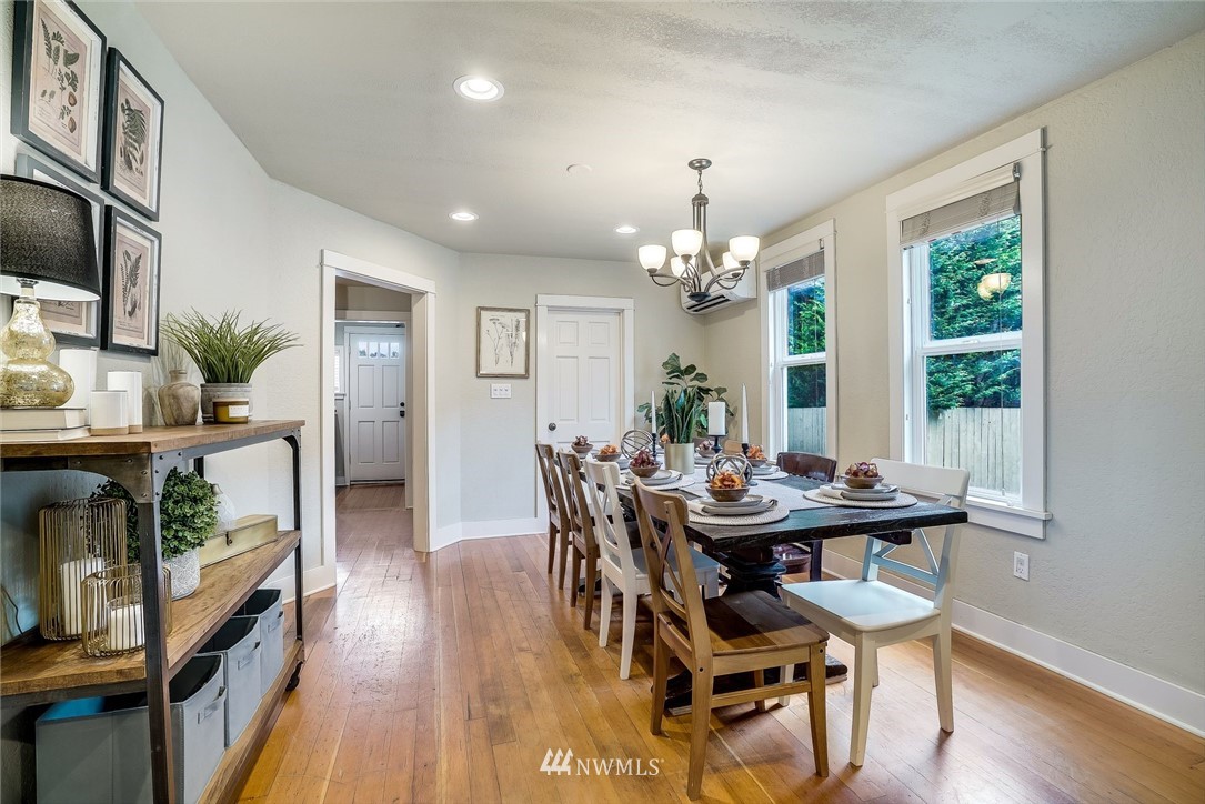 2309 Baker Avenue Everett, WA 98201 - Photo 8 of 26 a view of a dining room with furniture and wooden floor