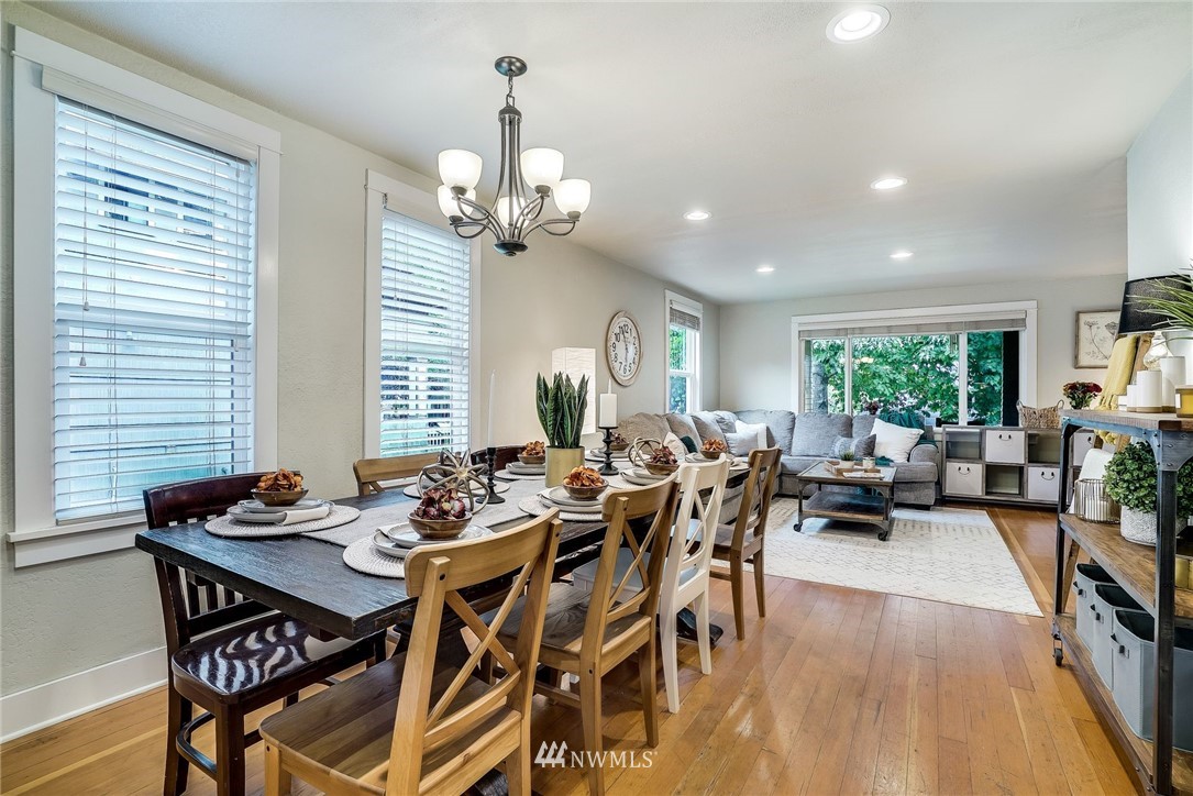 2309 Baker Avenue Everett, WA 98201 - Photo 9 of 26 a view of a dining room with furniture window and wooden floor