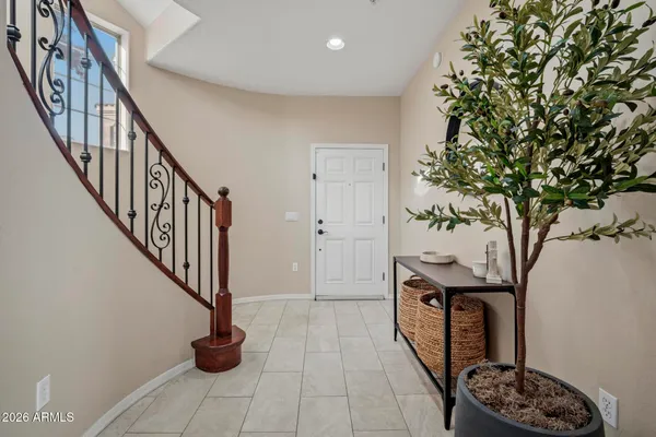 a view of entryway with wooden floor
