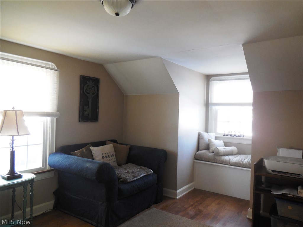 210 Linden Road Kent, OH 44240 - Photo 8 of 12 Bedroom 2 is located at the top of the steps and has hardwood floor and don't you just love that window seat, how cozy is that to sit and read a book or just chill out.