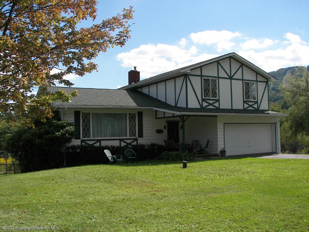 2 Rr Union Dale, PA 18470 - Photo 1 of 15 a view of a house with back yard