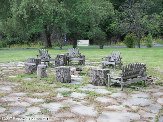 2 Rr Union Dale, PA 18470 - Photo 5 of 15 a view of a table and chairs in the garden