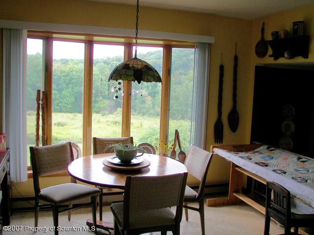 2 Rr Union Dale, PA 18470 - Photo 7 of 15 a dining room with furniture and window