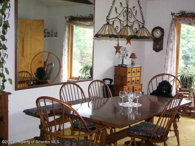 2 Rr Union Dale, PA 18470 - Photo 8 of 15 a view of a dining room with furniture window and outside view
