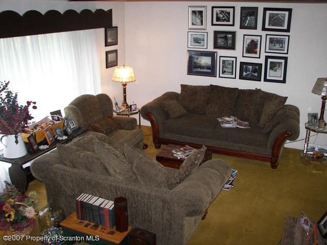 2 Rr Union Dale, PA 18470 - Photo 9 of 15 a living room with furniture and a window