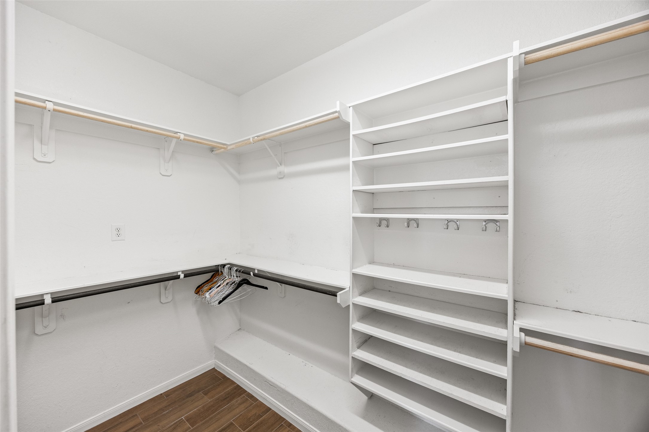 6014 Flagg Ranch Court Spring, TX 77388 - Photo 16 of 23 a view of walk in closet with empty racks