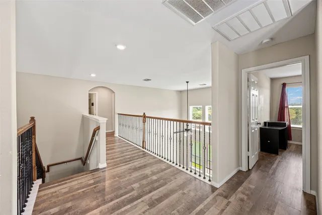 a view of entryway with wooden floor