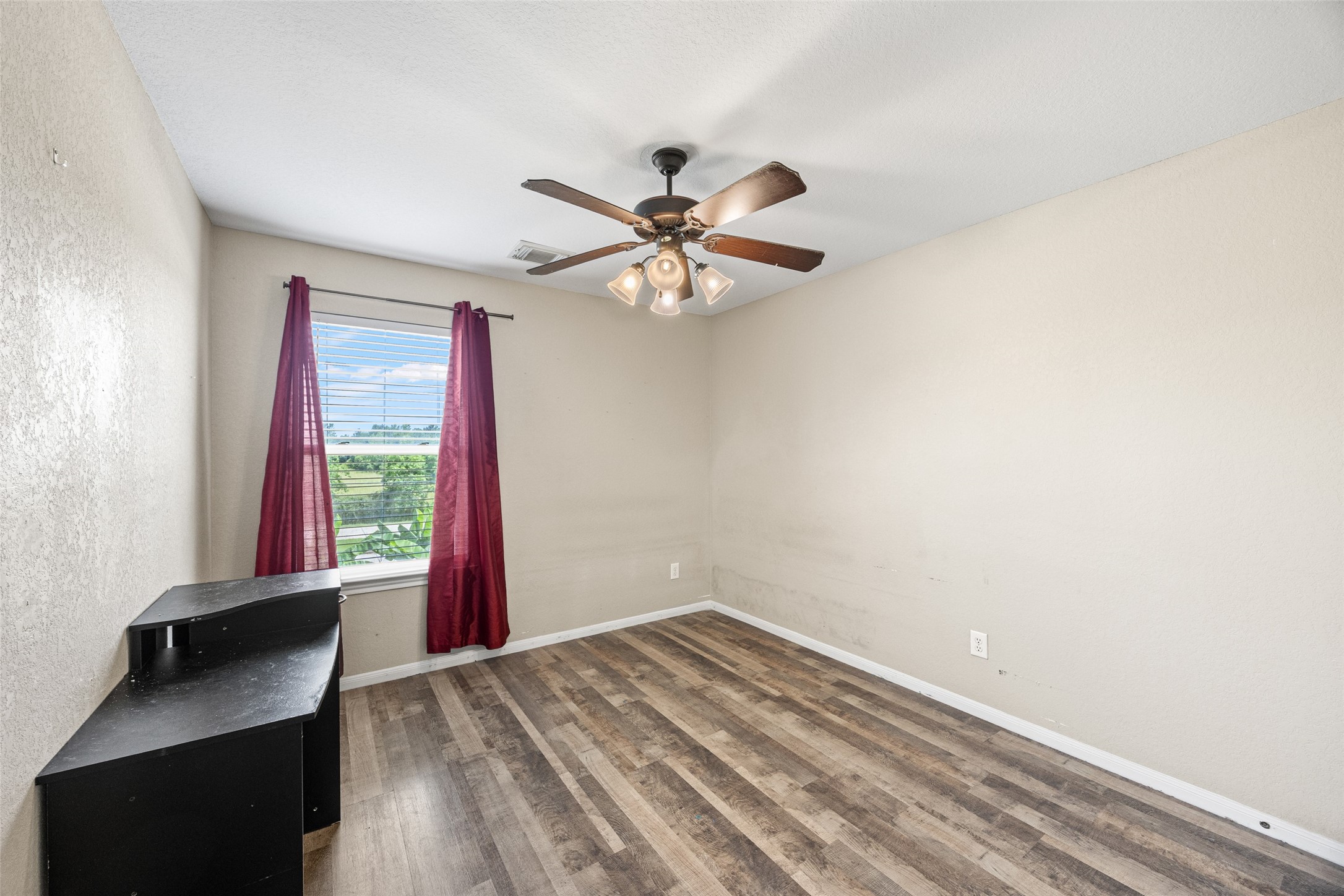 6014 Flagg Ranch Court Spring, TX 77388 - Photo 19 of 23 a view of an empty room with a window