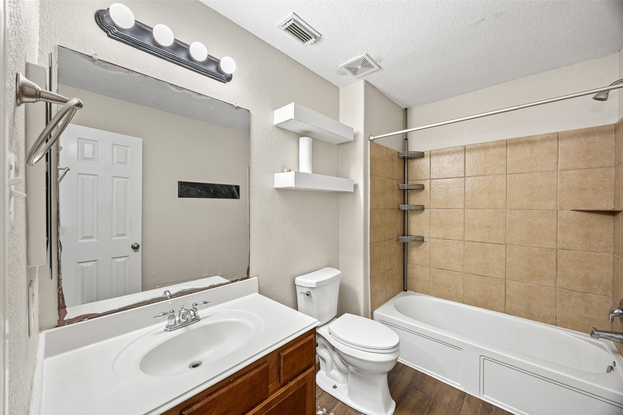 6014 Flagg Ranch Court Spring, TX 77388 - Photo 21 of 23 a bathroom with a sink a toilet and shower