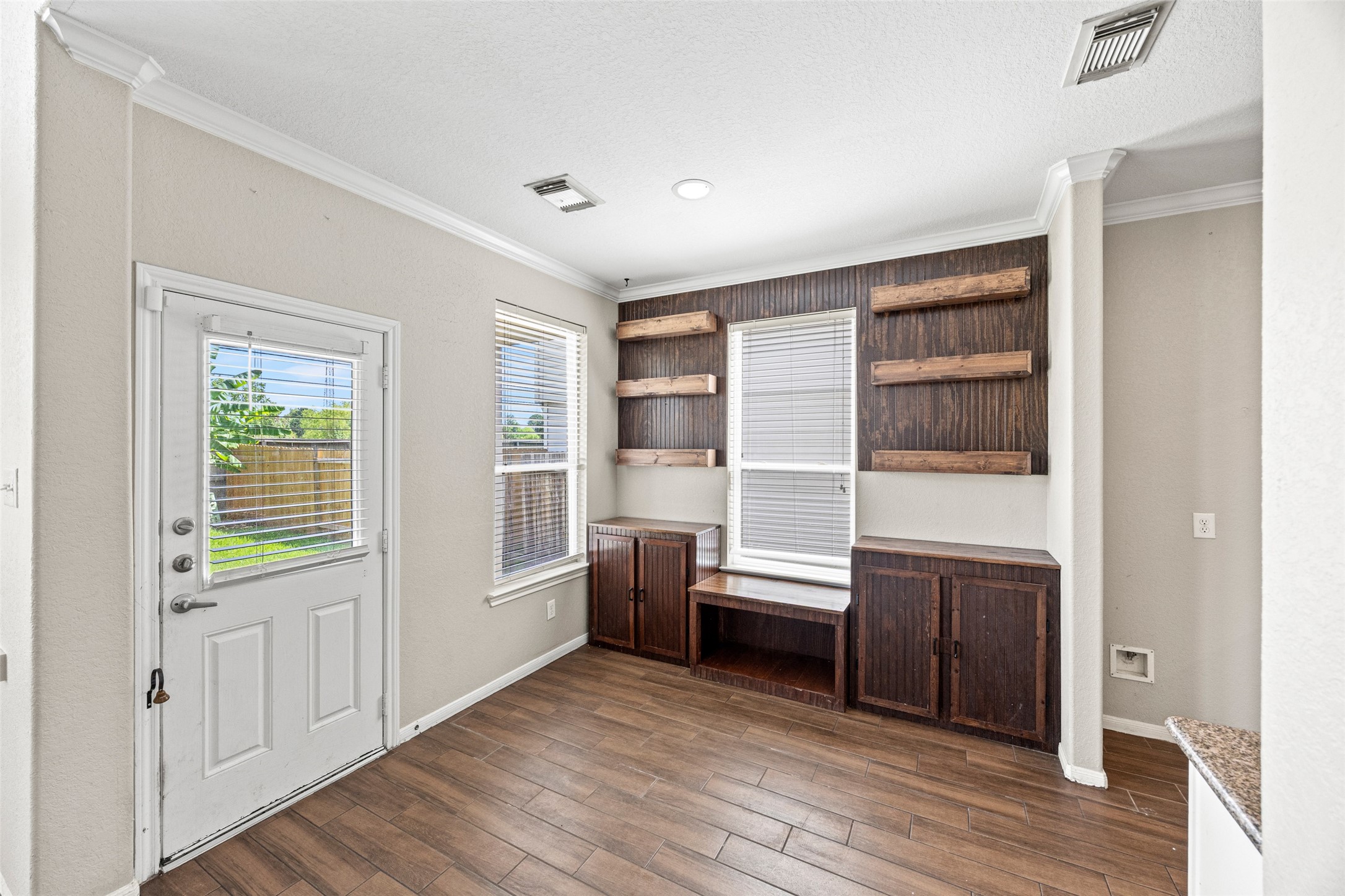 6014 Flagg Ranch Court Spring, TX 77388 - Photo 8 of 23 a view of wooden floor and windows in a room