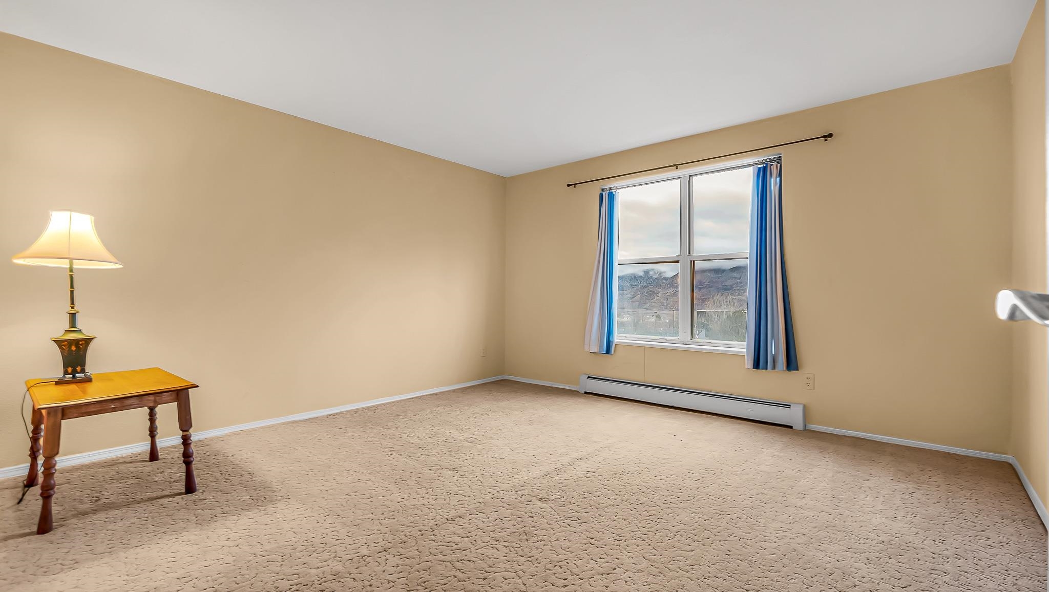 12 West Ridge Court Parachute, CO 81635 - Photo 22 of 37 a view of an empty room with a window