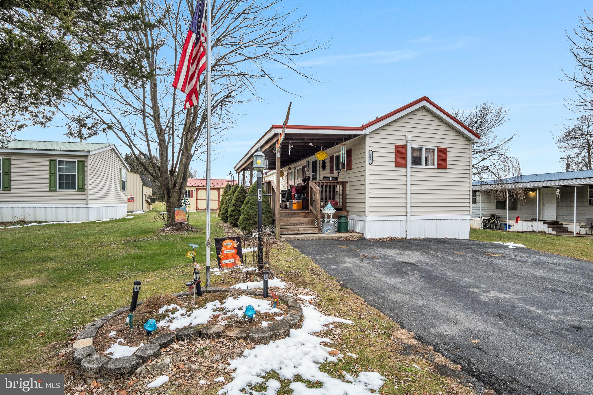 63 Big Spring Terrace Newville, PA 17241 - Photo 15 of 23 a front view of a house with a yard