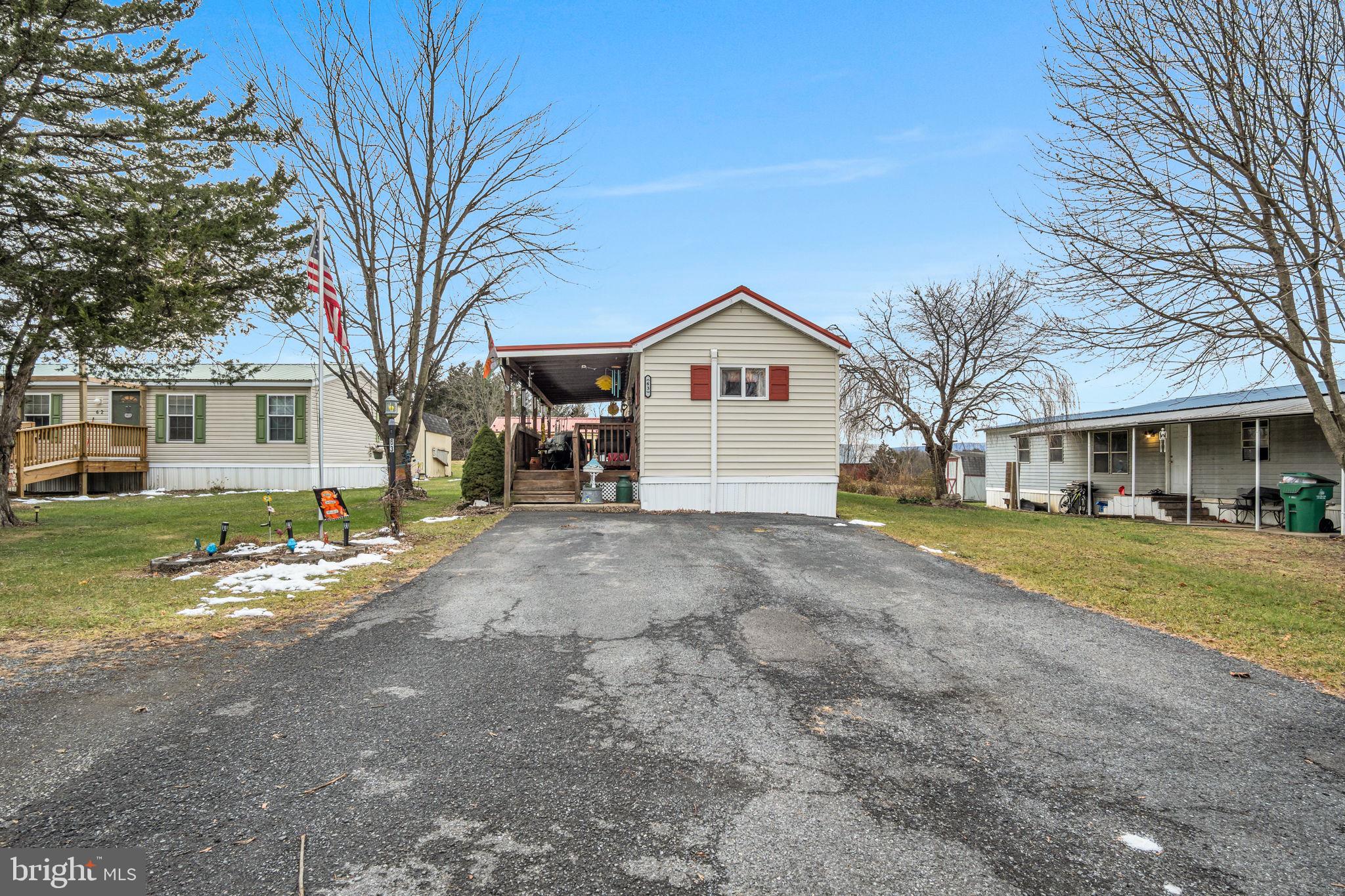 63 Big Spring Terrace Newville, PA 17241 - Photo 16 of 23 a view of a house with a yard and large tree