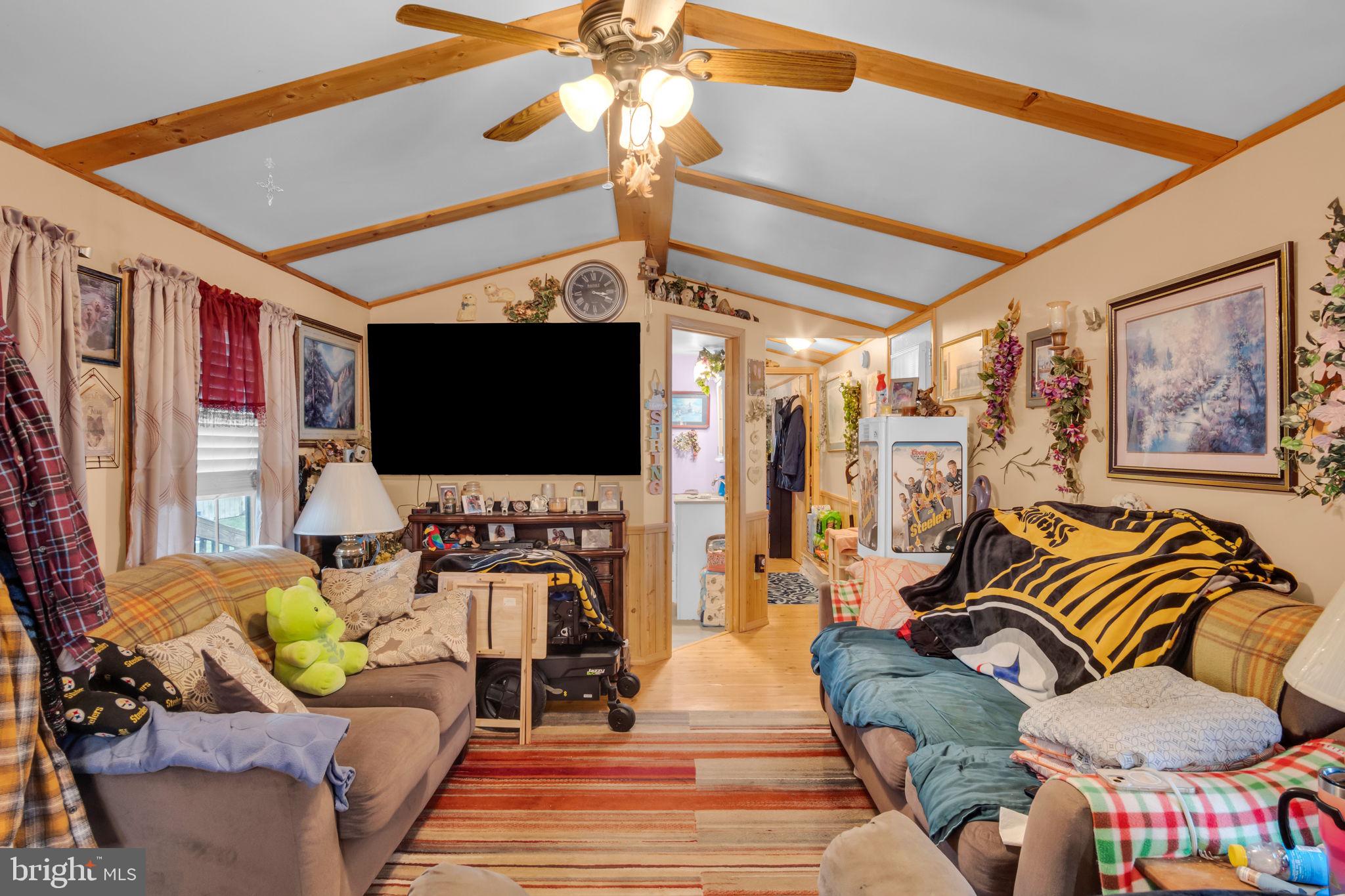 63 Big Spring Terrace Newville, PA 17241 - Photo 2 of 23 a living room with furniture and a flat screen tv