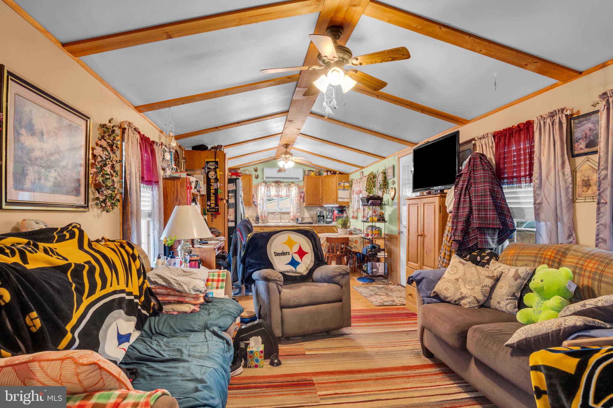 63 Big Spring Terrace Newville, PA 17241 - Photo 5 of 23 a living room with furniture a fireplace and a window