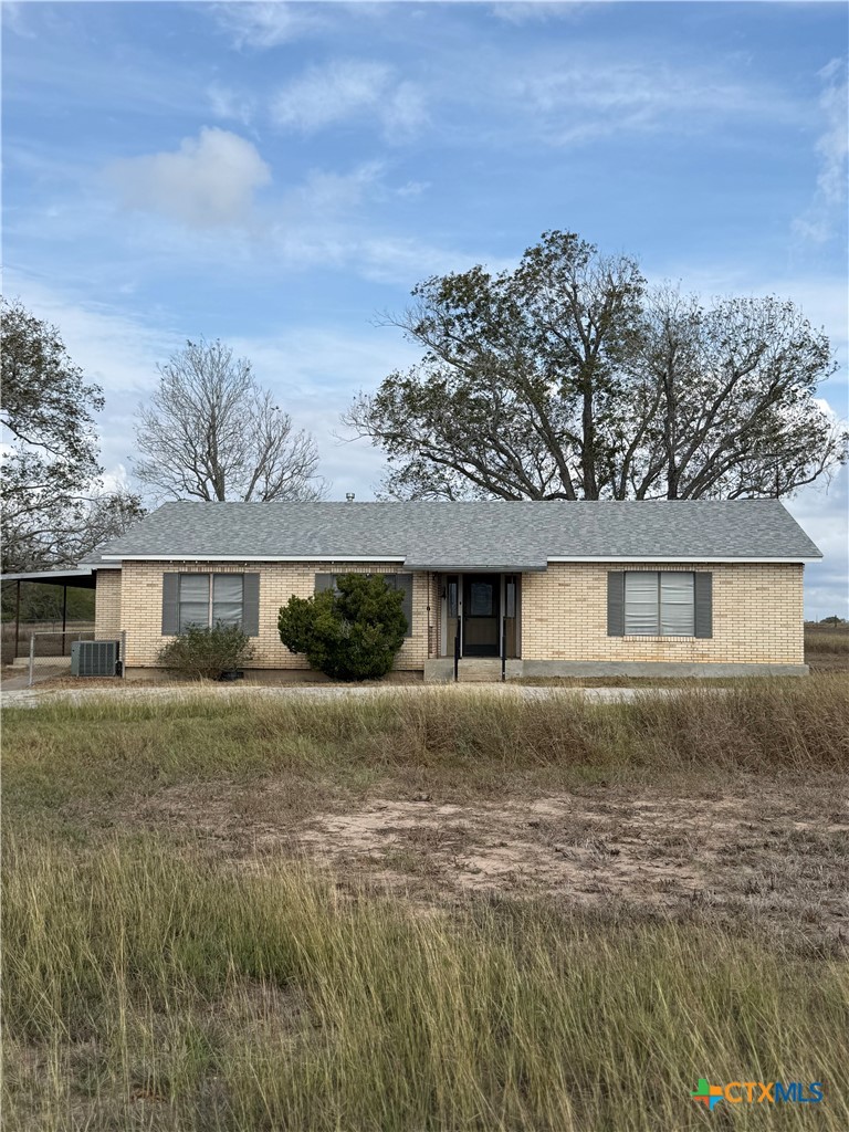 4689 County Road 302 Runge, TX 78151 - Photo 32 of 40 a view of house with yard