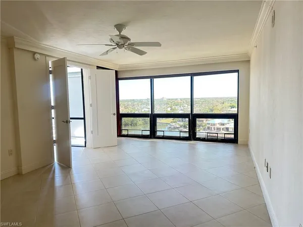 a view of an empty room and window