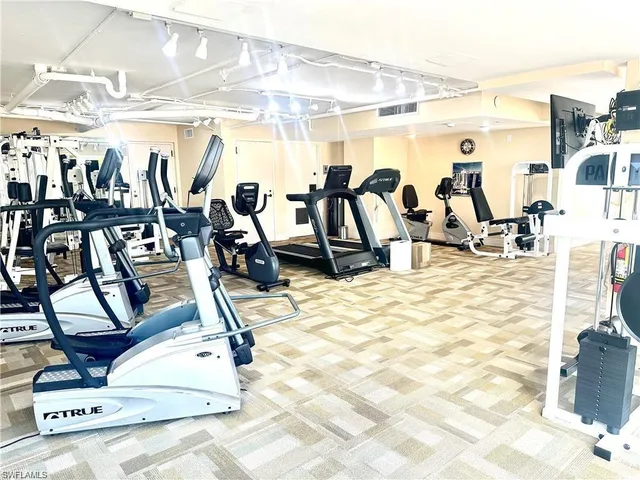 a view of swimming pool with chairs